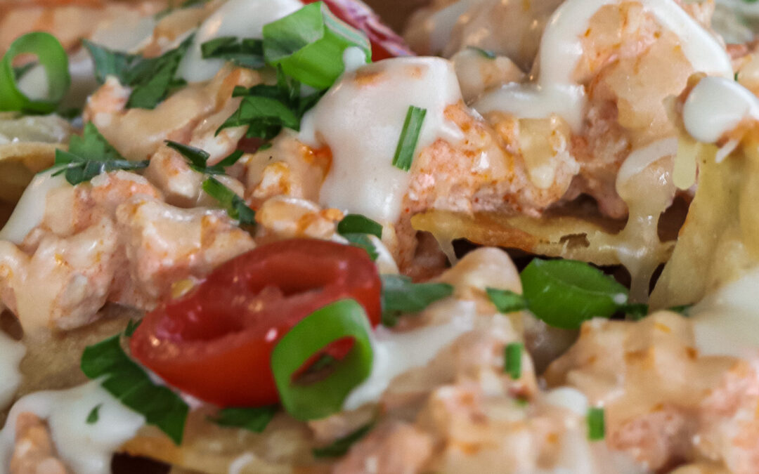 Ultimate Buffalo Chicken Nachos with Addicting Blue Cheese Queso